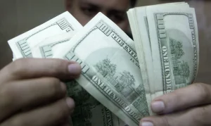 Dólar Dispara para R$ 5,19 Pós-Fed: Juros nos EUA em Alta e Bolsa Brasileira Resiste com Oitava Alta Consecutiva